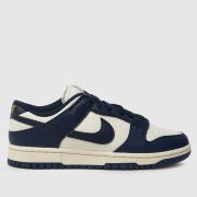 Nike dunk low trainers in ivory & navy